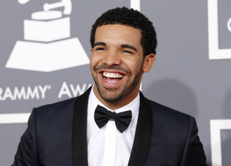 Rapper Drake arrives at the 55th annual Grammy Awards in Los Angeles, California February 10, 2013. REUTERS/Mario Anzuoni (UNITED STATES - Tags: ENTERTAINMENT) (GRAMMYS-ARRIVALS) - RTR3DM4C